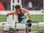 Atlet lempar cakram Indonesia I Kadek Dwi Purwana Yasa melakukan lemparan pada final atletik lempar cakram putra F57 di Stadion Paloma Mizuho, Nagoya, Aichi, Jepang, Selasa (20/10/2026).